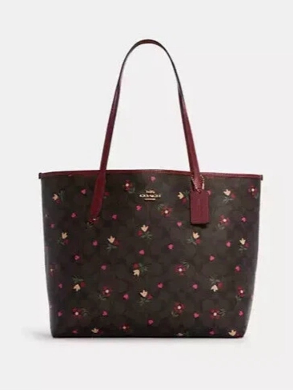 Authentic Coach City Tote bag is crafted from signature coated cavas